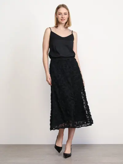 Юбка черного цвета из фактурного трикотажа